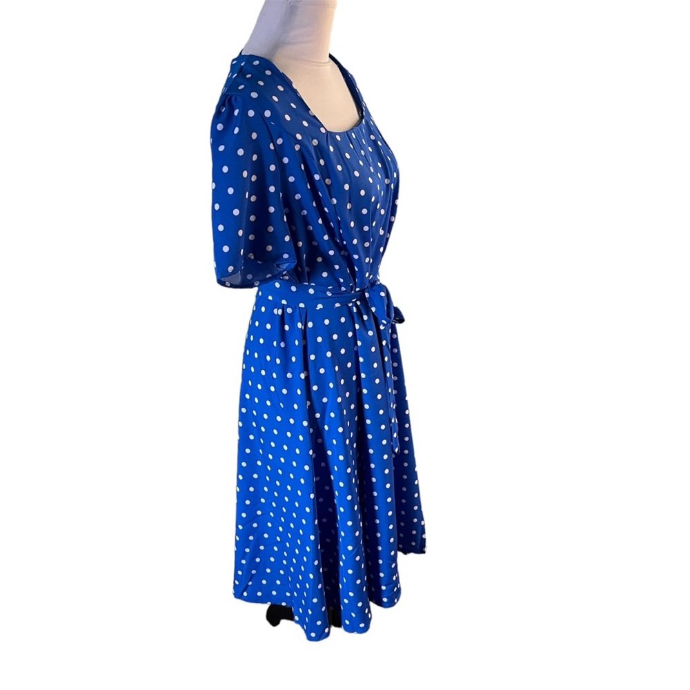 Belted blue with white poka dots dress, short sleeves knee length.19pp X 40L